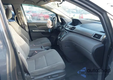 2016 Honda Odyssey Se z USA, uszkodzony, nr VIN 5FNRL5H35GB040192